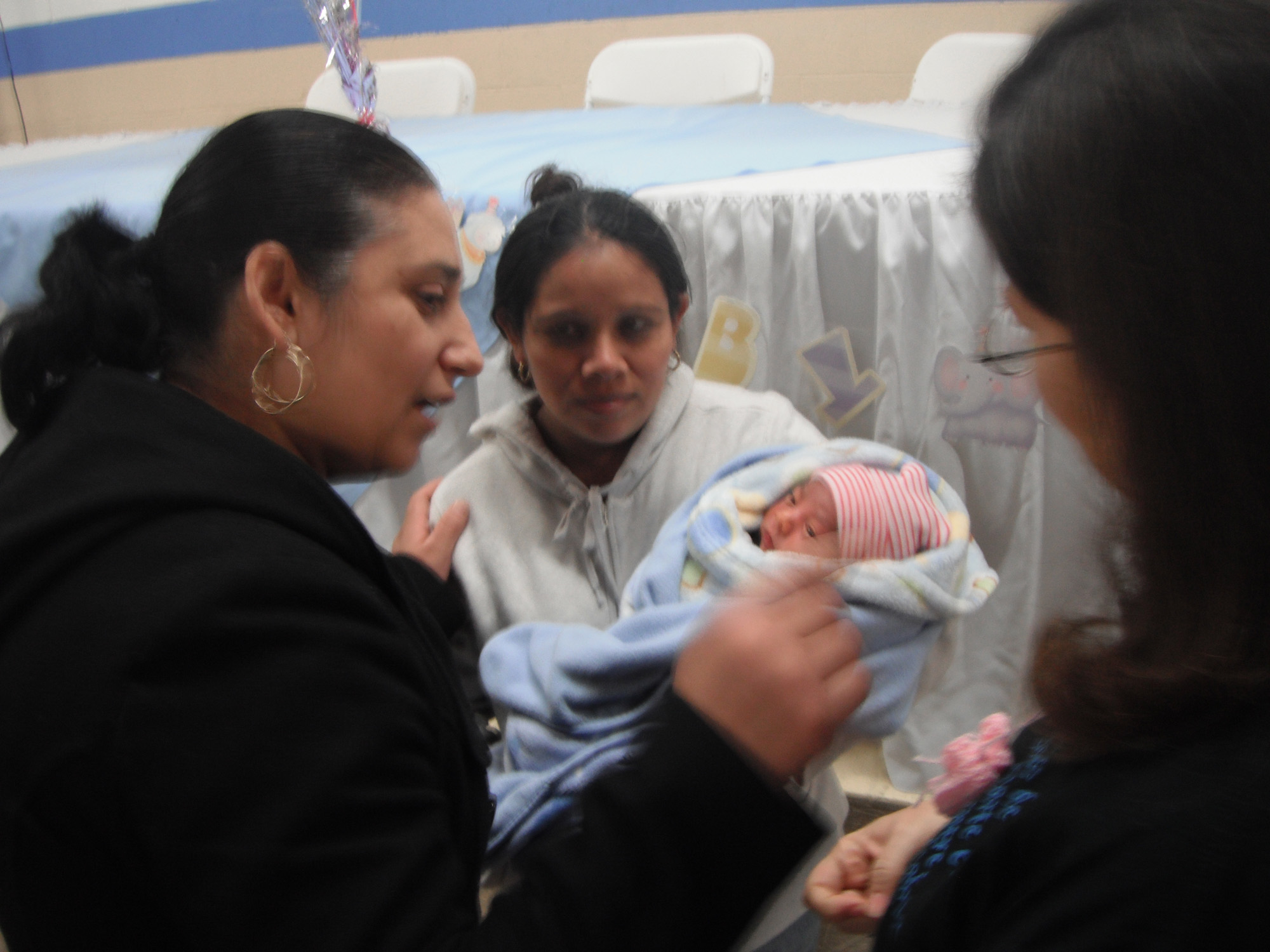 Sharing God's love Sharing God's love with a mother and baby at December 26 baby shower