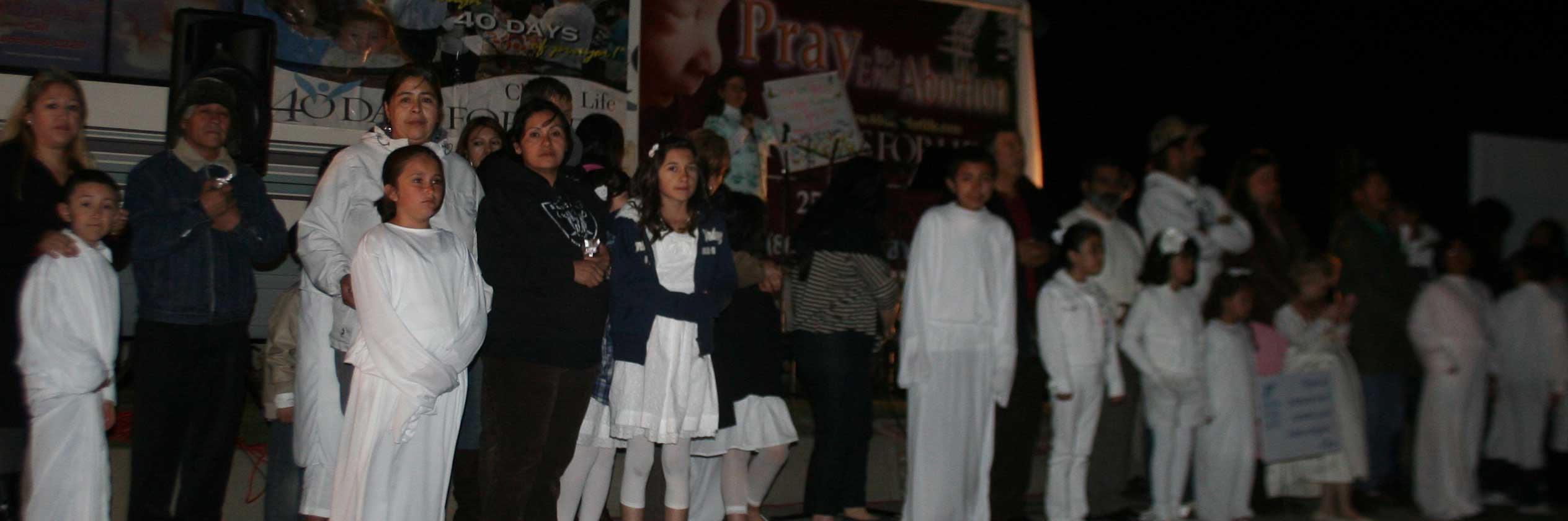 At the Closing Celebration, Terri Palmquist announces that 24 babies were known to be saved from abortion during the Spring 2012 40 Days for Life campaign in Bakersfield.